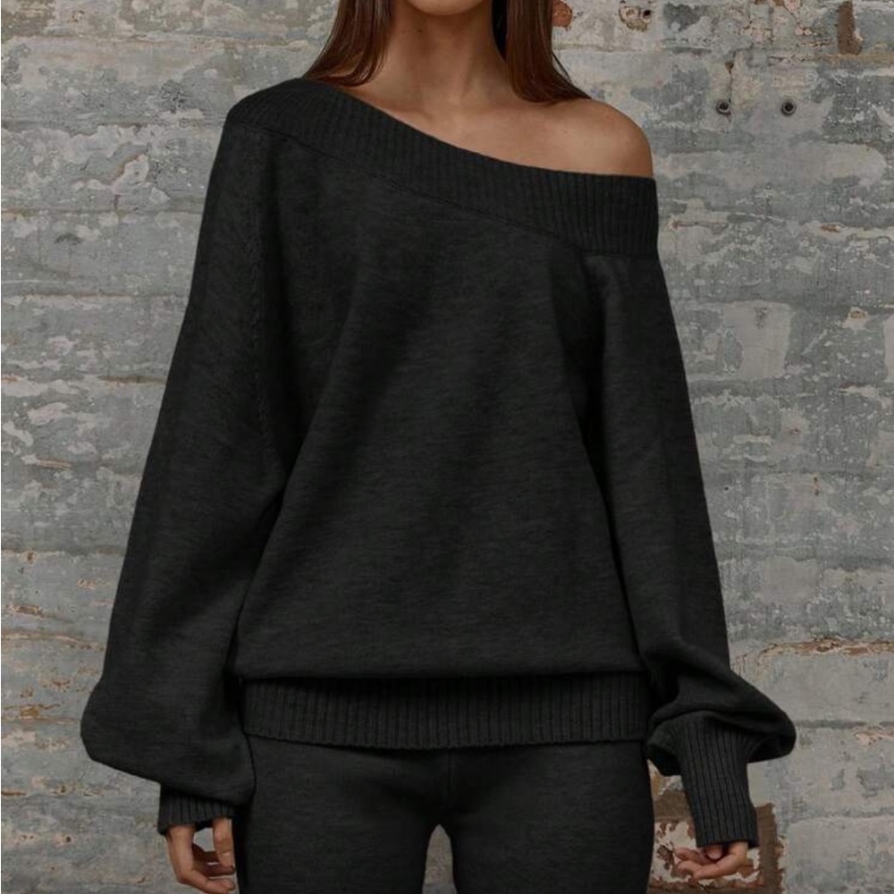 Black off shoulder asymmetrical oversized chunky knit sweater